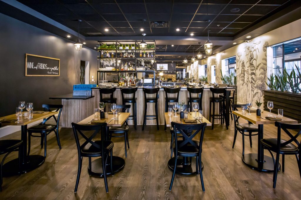 555 North bar area with two top tables
